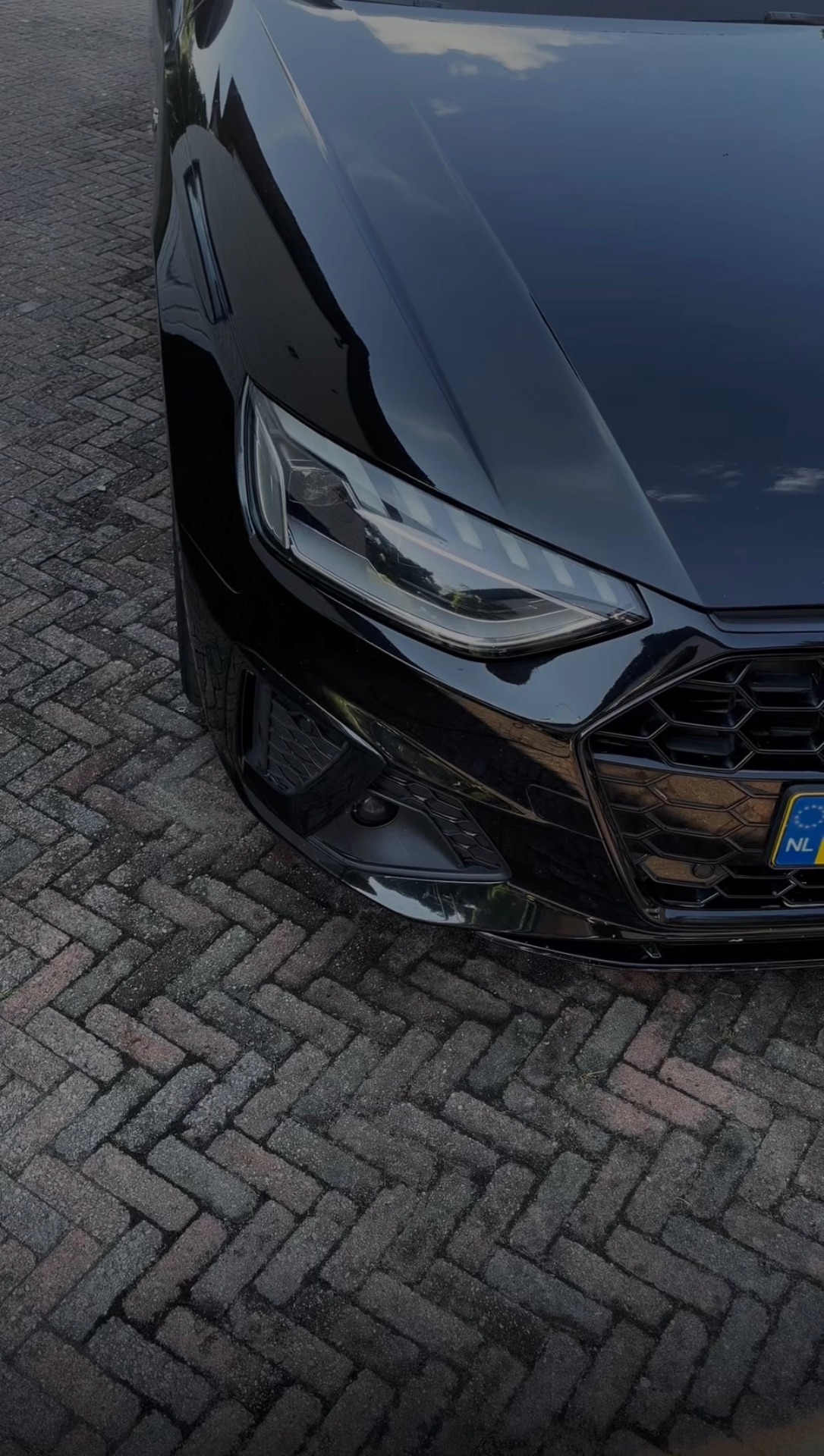 Glanzende zwarte Audi met diepe lakglans na wasbeurt door Mike's Autowas